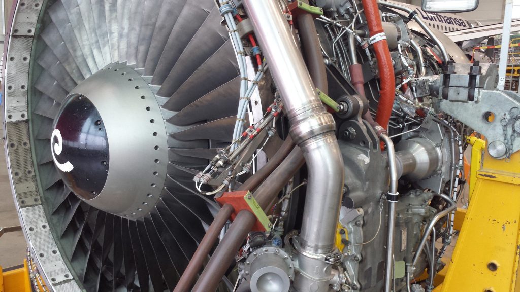 Industrial Adhesives Article. Close up of jet engine under repair.